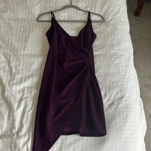 Purple asymmetrical mini dress.